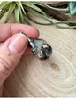 Image for the-drop-of-rhodoniet-hanger_1.jpg